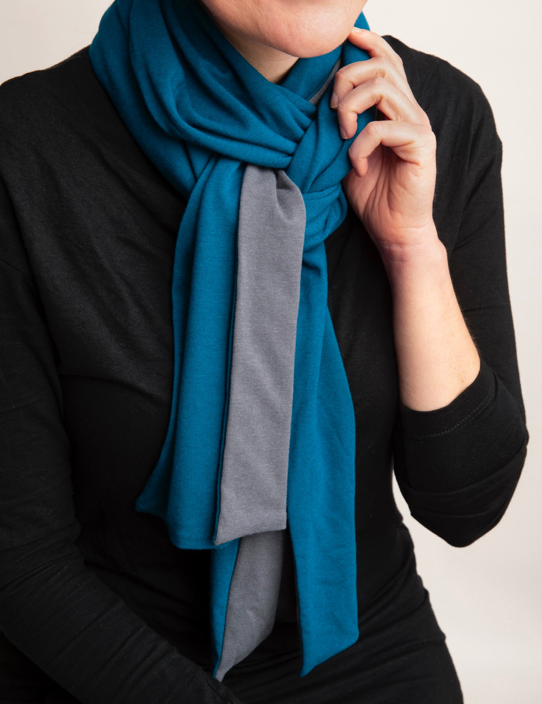 Woman wearing Everyday Sabbatical lightweight scarf — soft, breathable knit layer.