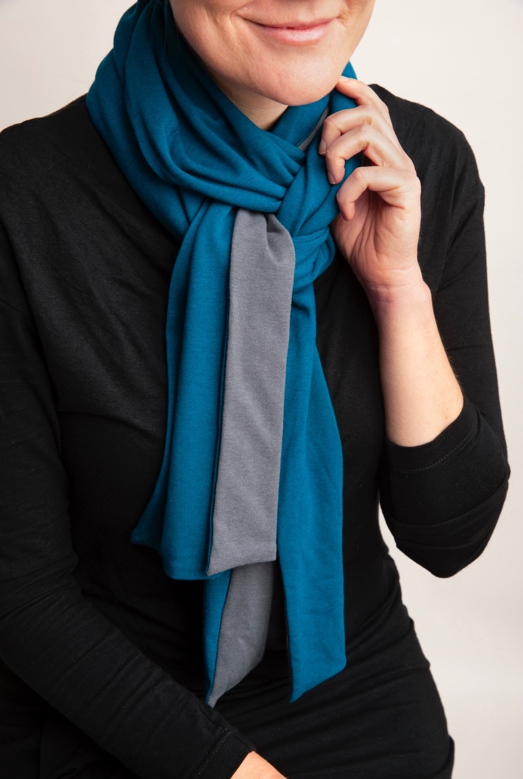 Woman wearing Everyday Sabbatical lightweight scarf — soft, breathable knit layer.