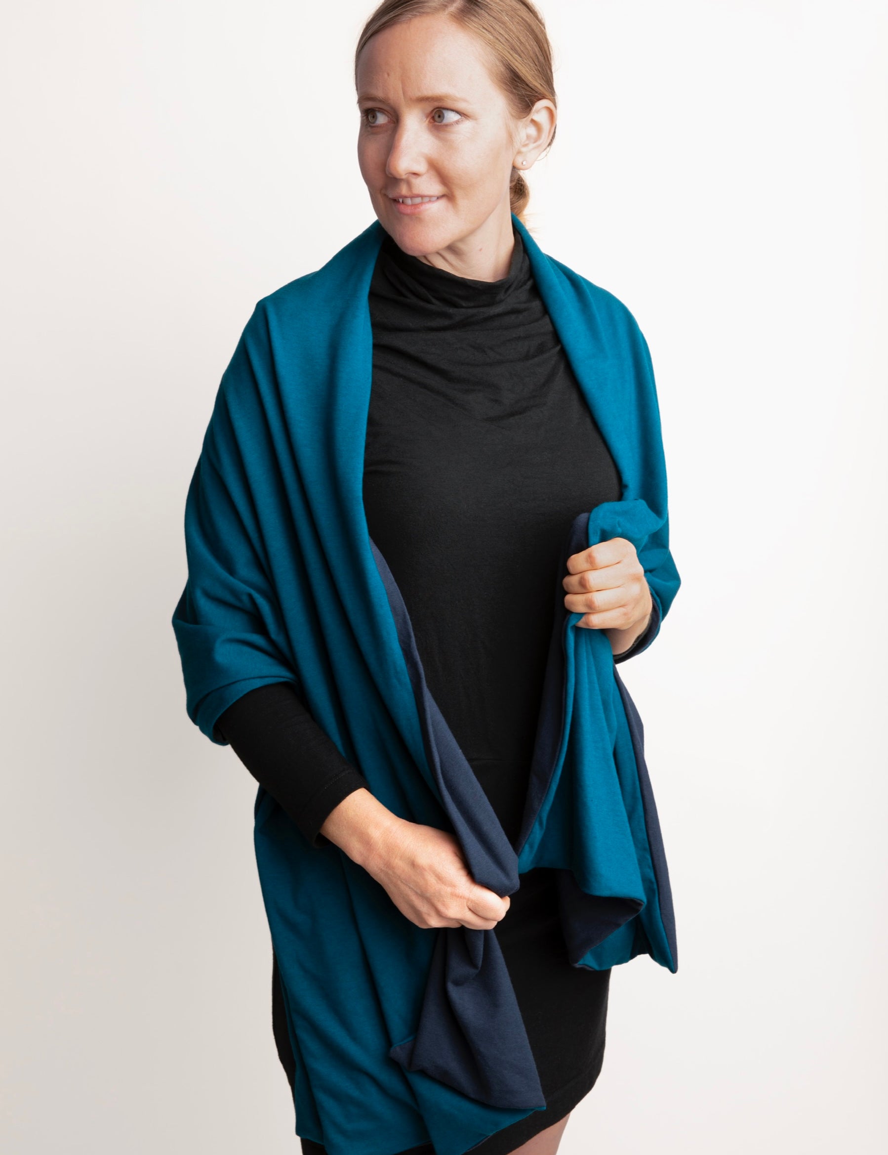 Woman wearing Everyday Sabbatical oversized pashmina — lightweight travel wrap.