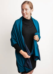 Woman wearing Everyday Sabbatical oversized pashmina — lightweight travel wrap.