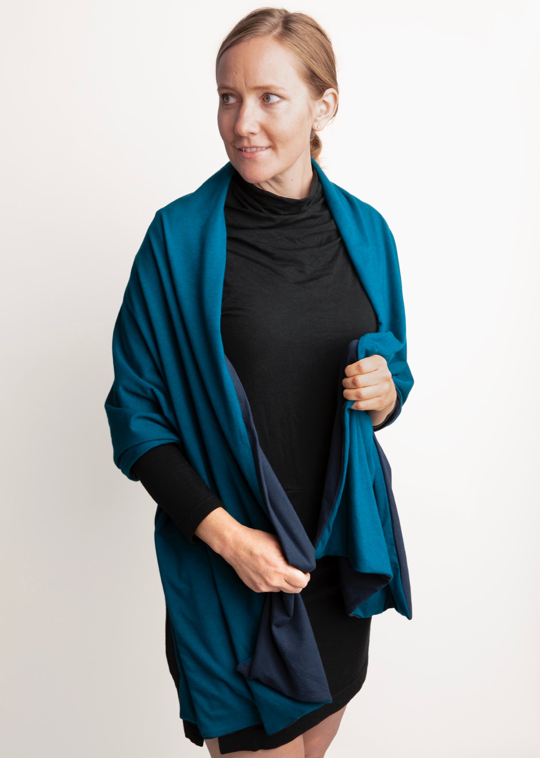 Woman wearing Everyday Sabbatical oversized pashmina — lightweight travel wrap.