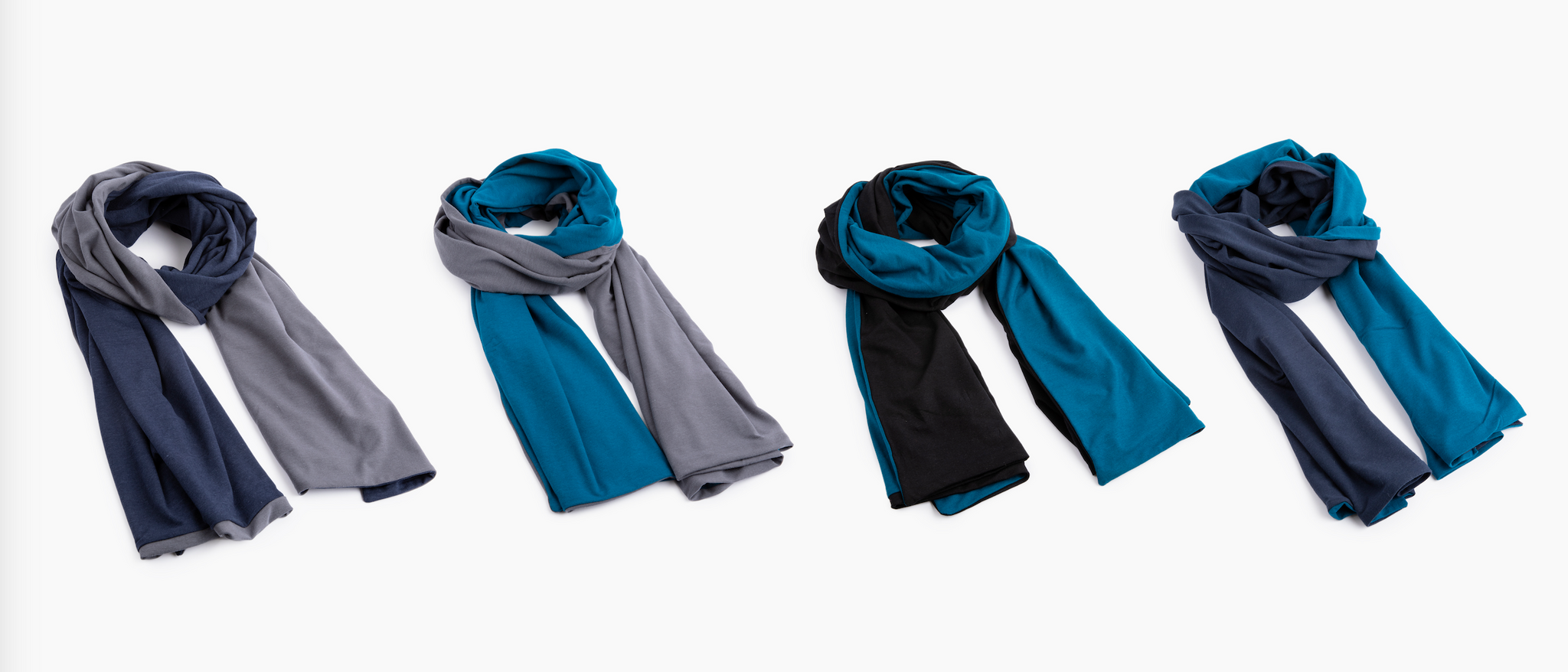 Everyday Sabbatical oversized pashminas in different color combinations  — lightweight travel wraps.
