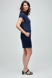 Everyday Sabbatical Sleeveless Dress — flattering draped waist, capped shoulder, faux-wrap skirt.